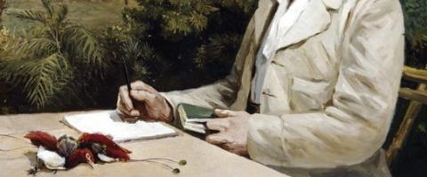 Alfred Russel Wallace at his table