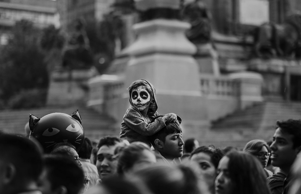 Boy in Day of the Dead mask_journal of wild culture ©2025.jpg