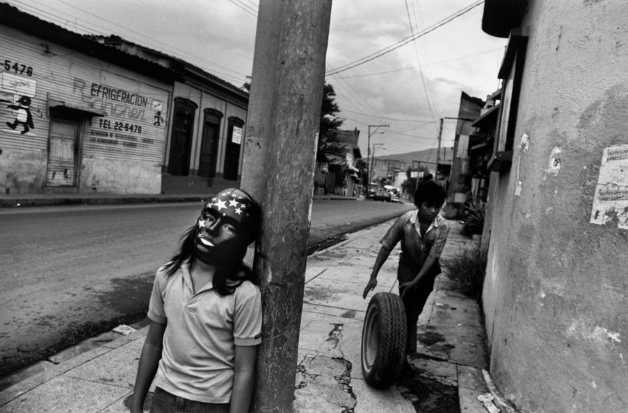 Masked Boy auto garage_Larry Towell_journal of wild culture 2025.jpg