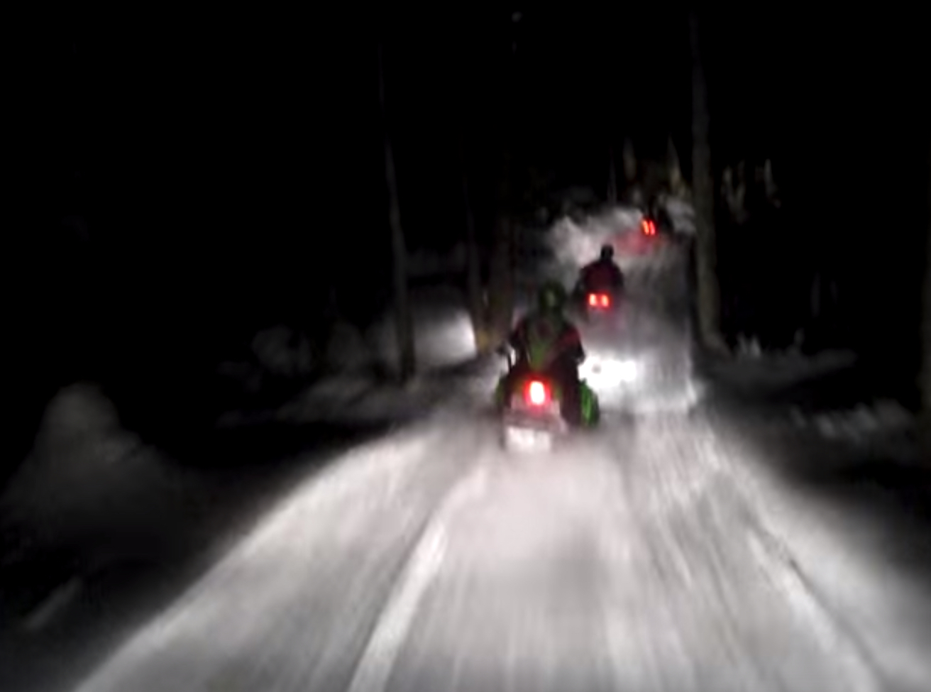 snowmobiles at night, journal of wild culture