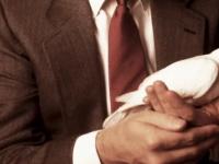Man holding dove_journal of wild culture